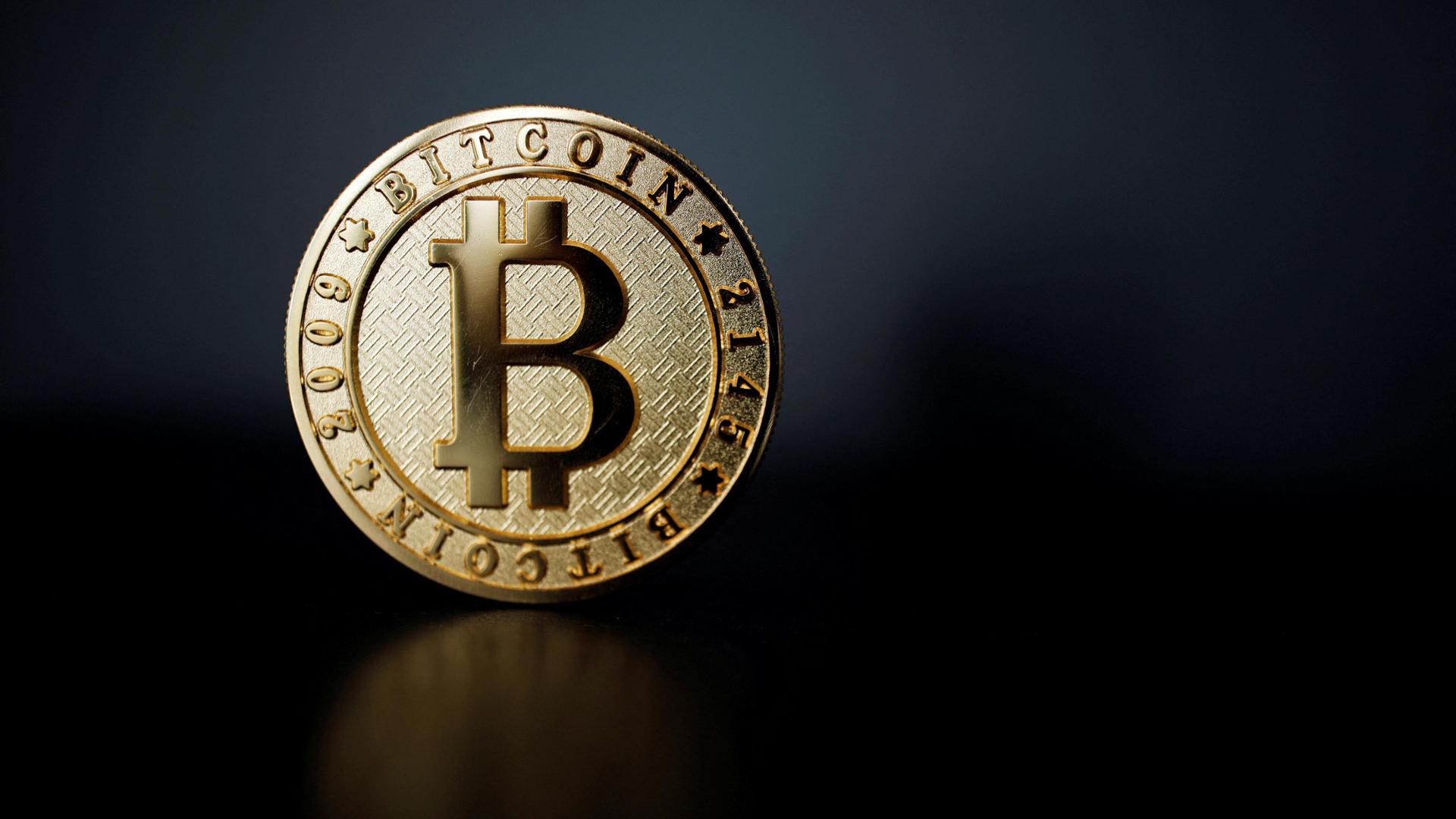 Bitcoin, valore record: quasi 100mila dollari - La Stampa