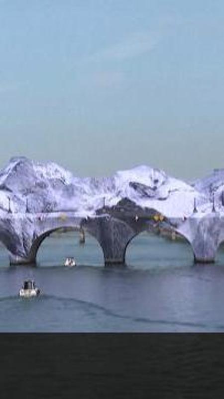 Parigi, Pont Neuf trasformato da JR divide il pubblico: "Ma che c'entrano le montagne?"